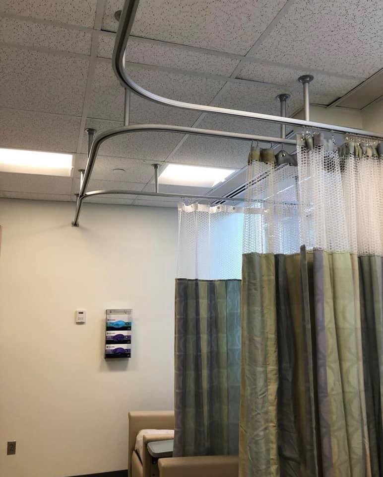 Cubicle curtains and ceiling tracks installed by Melmar in an exam room