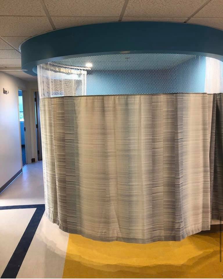 Curved cubicle curtain track installed by Melmar in a care facility