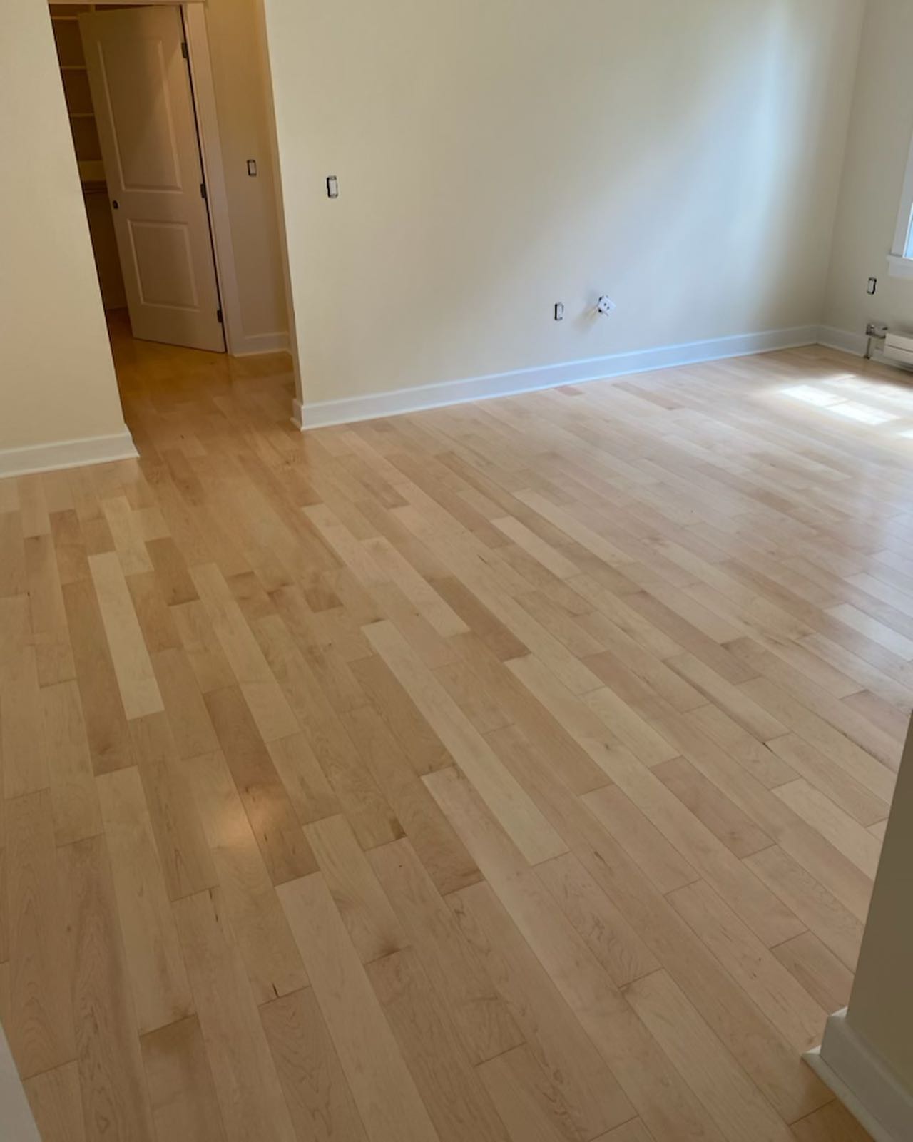 Maple hardwood flooring installed by Melmar